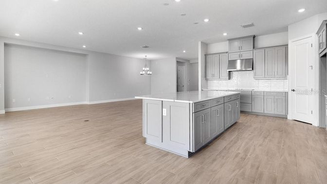 Chandelier, Interior, Kitchen, Recessed Lighting, Stainless Steel Appliances, Wood Texture Flooring