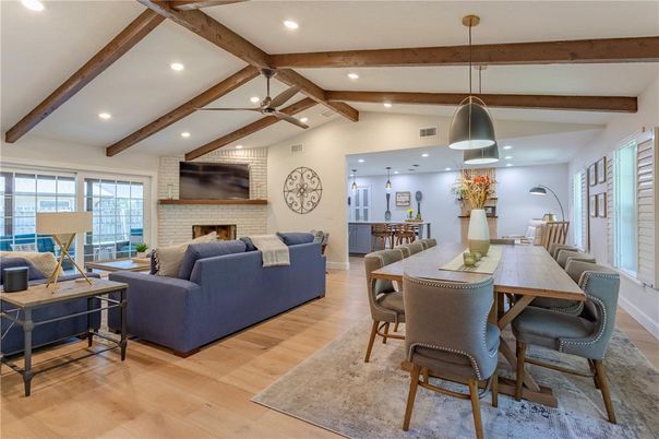 Dining room, Fireplace, Interior, Living room, Pendant Lights, Recessed Lighting, Stone Walls, Wooden Beams, Wood Texture Flooring