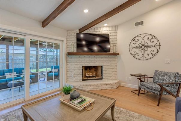 Fireplace, Interior, Living room, Recessed Lighting, Stone Walls, Wooden Beams, Wood Texture Flooring