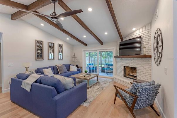 Fireplace, Interior, Living room, Recessed Lighting, Stone Walls, Wooden Beams, Wood Texture Flooring