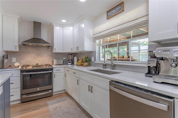 Interior, Kitchen, Recessed Lighting, Stainless Steel Appliances, Wood Texture Flooring