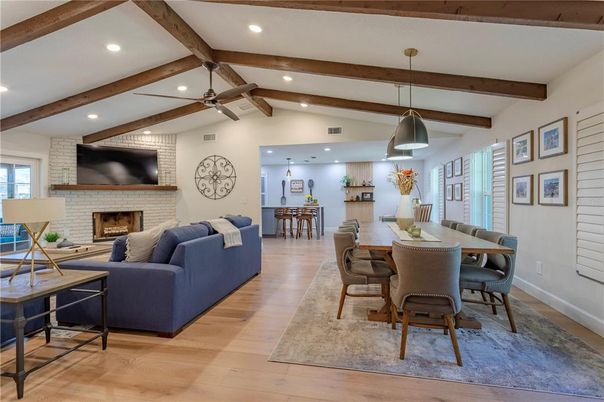 Dining room, Fireplace, Interior, Living room, Pendant Lights, Recessed Lighting, Stone Walls, Wooden Beams, Wood Texture Flooring