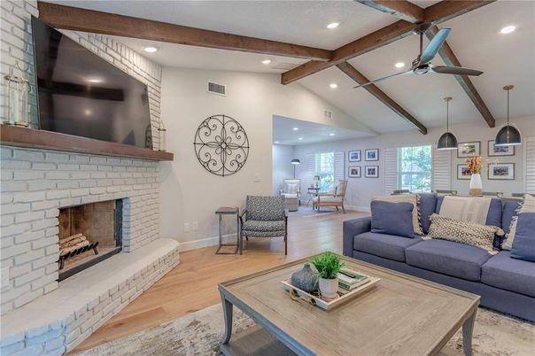 Dining room, Fireplace, Interior, Living room, Pendant Lights, Recessed Lighting, Stone Walls, Wooden Beams, Wood Texture Flooring