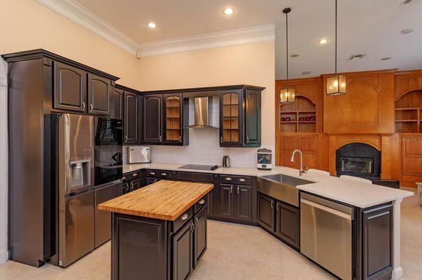 Fireplace, Interior, Kitchen, Pendant Lights, Recessed Lighting, Stainless Steel Appliances