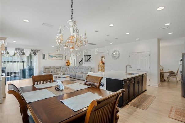 Chandelier, Dining room, Interior, Kitchen, Living room, Recessed Lighting, Wood Texture Flooring