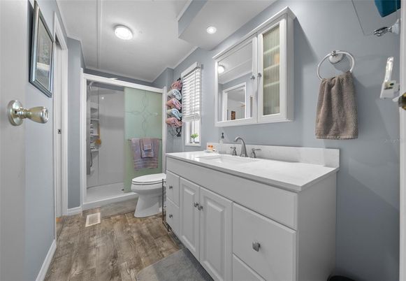 Bathroom, Glass Shower, Interior, Recessed Lighting, Wood Texture Flooring