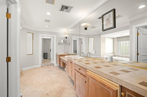 Bathroom, Dual Sink Vanities, Interior, Recessed Lighting, Tile Countertops