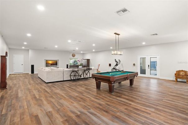 Billiard Table, Game Room, Interior, Living room, Pendant Lights, Recessed Lighting, Wood Texture Flooring
