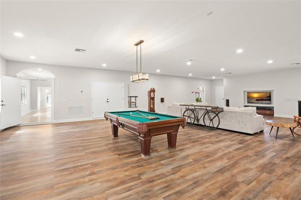 Billiard Table, Game Room, Interior, Living room, Pendant Lights, Recessed Lighting, Wood Texture Flooring