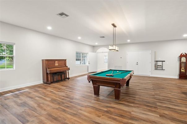 Billiard Table, Game Room, Interior, Pendant Lights, Piano, Recessed Lighting, Wood Texture Flooring