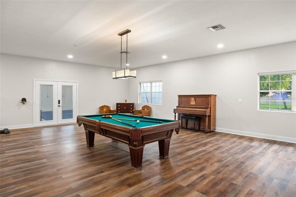 Billiard Table, Game Room, Interior, Pendant Lights, Piano, Recessed Lighting, Wood Texture Flooring