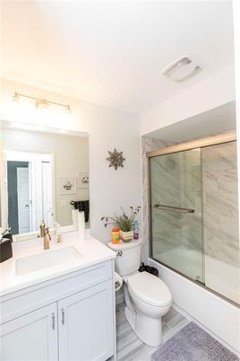 Bathroom, Glass Shower, Interior, Marble Walls, Wood Texture Flooring