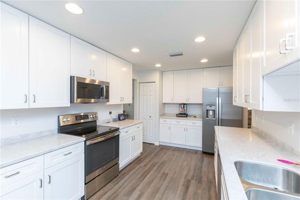 Interior, Kitchen, Recessed Lighting, Stainless Steel Appliances, Wood Texture Flooring