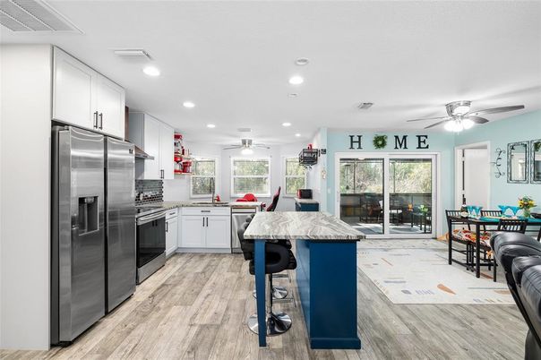 Dining room, Interior, Kitchen, Recessed Lighting, Stainless Steel Appliances, Wood Texture Flooring