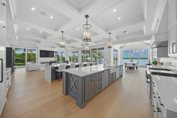 Chandelier, Dining room, Interior, Kitchen, Living room, Pendant Lights, Recessed Lighting, Water, Wood Texture Flooring