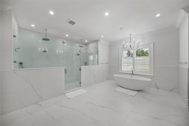 Bathroom, Chandelier, Free Standing Baths, Glass Shower, Interior, Marble, Marble Walls, Recessed Lighting