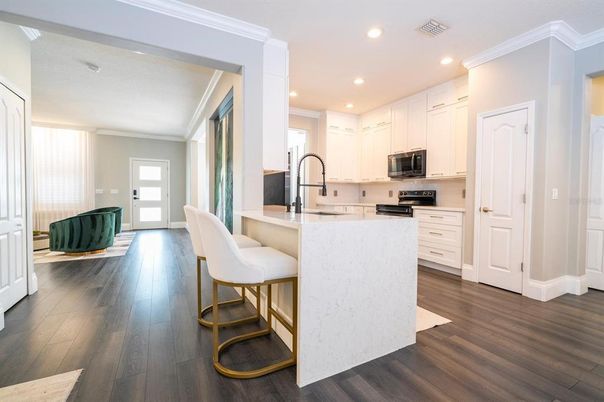 Interior, Kitchen, Recessed Lighting, Stainless Steel Appliances, Wood Texture Flooring