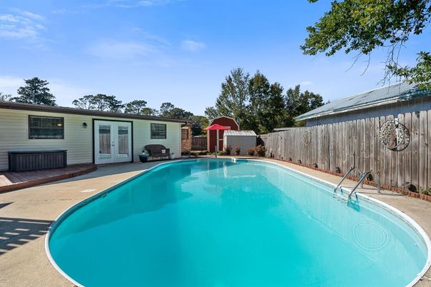 Exterior, Pool, Solar Panels