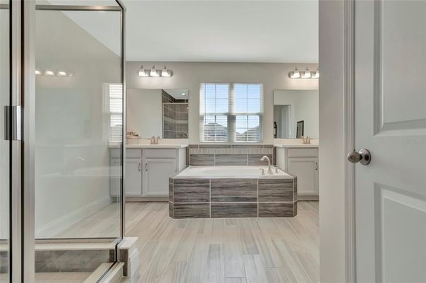 Bathroom, Dual Sink Vanities, Glass Shower, Interior, Wood Texture Flooring