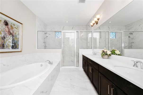Bathroom, Dual Sink Vanities, Glass Shower, Interior, Marble, Marble Walls, Recessed Lighting