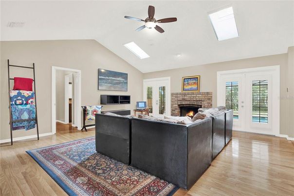Fireplace, Interior, Living room, Recessed Lighting, Wood Texture Flooring