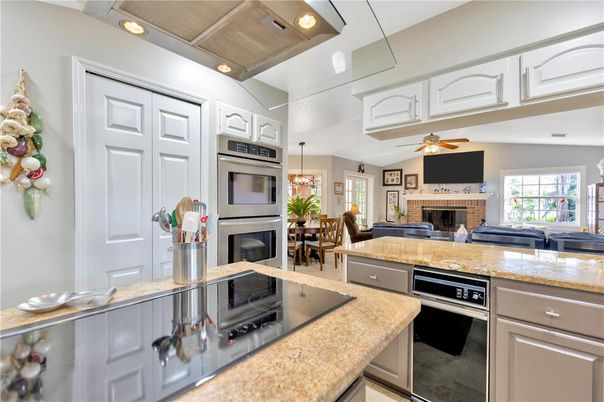 Dining room, Fireplace, Interior, Kitchen, Pendant Lights, Recessed Lighting, Stainless Steel Appliances