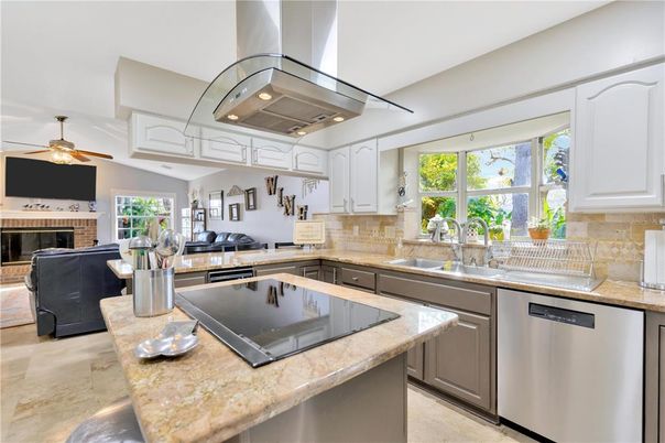 Fireplace, Interior, Kitchen, Living room, Recessed Lighting, Stainless Steel Appliances