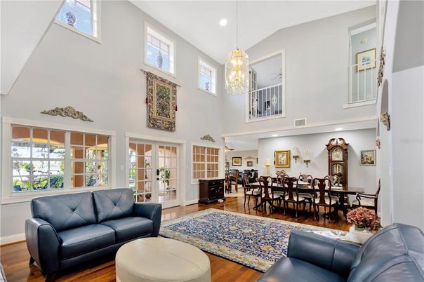 Chandelier, Dining room, Interior, Living room, Pendant Lights, Recessed Lighting, Wood Texture Flooring