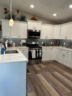 Interior, Kitchen, Pendant Lights, Recessed Lighting, Stainless Steel Appliances, Wood Texture Flooring