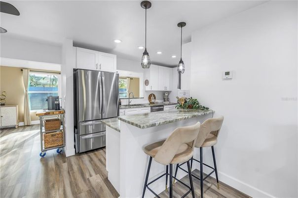 Interior, Kitchen, Pendant Lights, Recessed Lighting, Stainless Steel Appliances, Wood Texture Flooring