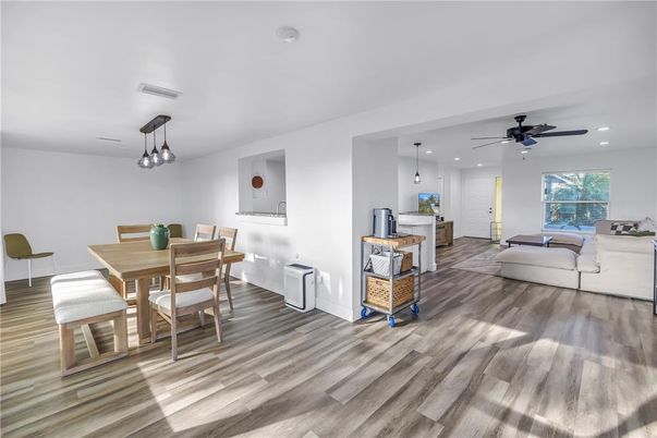 Dining room, Interior, Living room, Pendant Lights, Recessed Lighting, Wood Texture Flooring