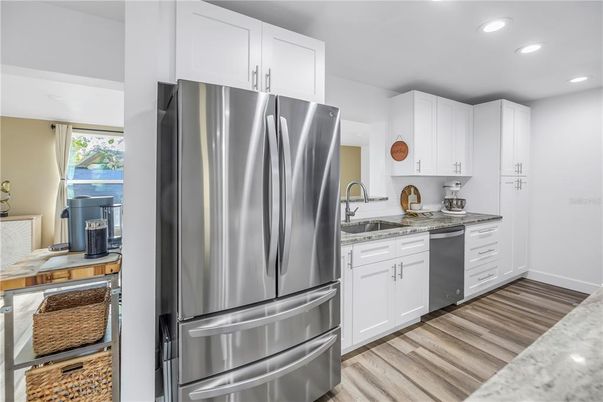Interior, Kitchen, Recessed Lighting, Stainless Steel Appliances, Wood Texture Flooring