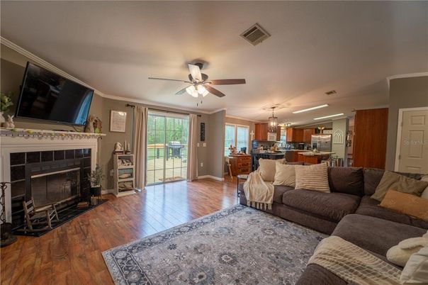 Dining room, Fireplace, Interior, Kitchen, Living room, Pendant Lights, Wood Texture Flooring