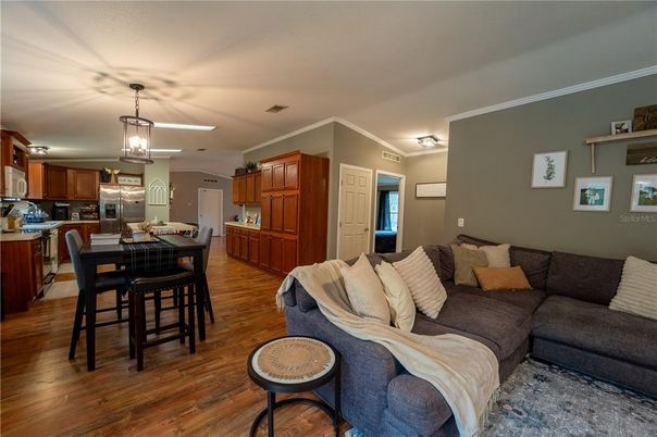 Dining room, Interior, Kitchen, Living room, Pendant Lights, Stainless Steel Appliances, Wood Texture Flooring