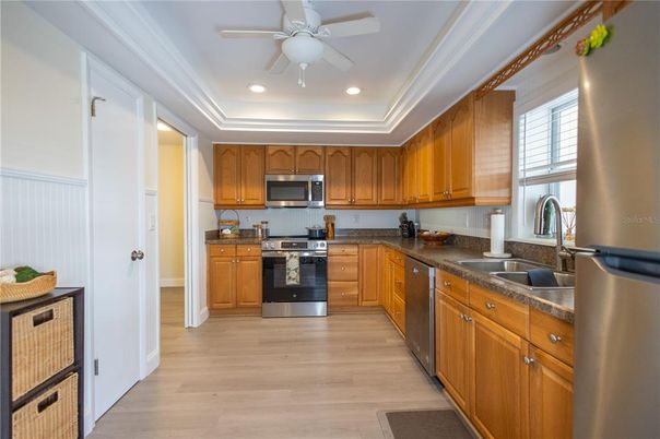 Interior, Kitchen, Recessed Lighting, Stainless Steel Appliances, Wood Texture Flooring