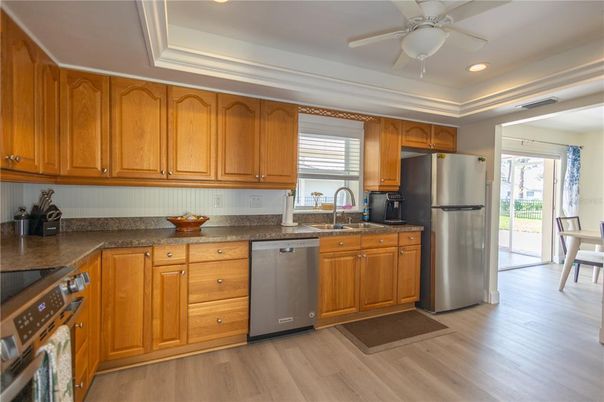 Interior, Kitchen, Recessed Lighting, Stainless Steel Appliances, Wood Texture Flooring