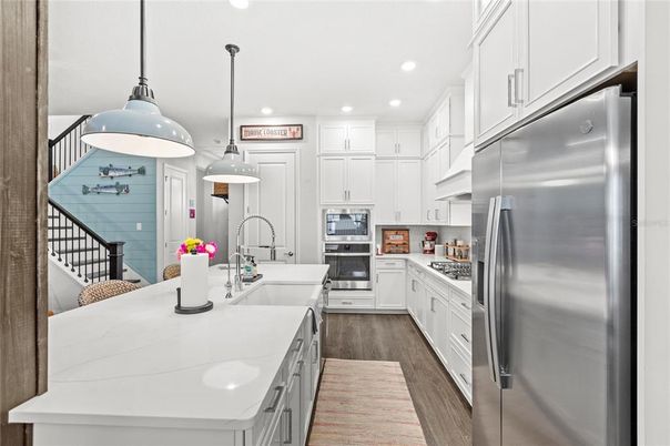 Interior, Kitchen, Pendant Lights, Recessed Lighting, Stainless Steel Appliances, Wood Texture Flooring