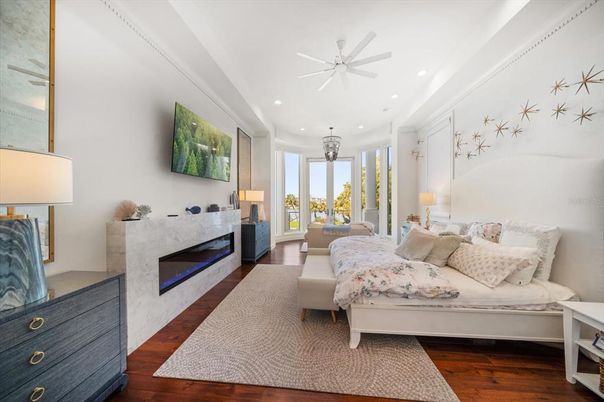 Bedroom, Fireplace, Interior, Recessed Lighting, Wood Texture Flooring