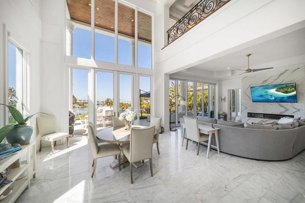 Dining room, Fireplace, Interior, Living room, Marble, Recessed Lighting, Wooden Ceilings