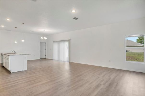Chandelier, Empty room, Interior, Kitchen, Pendant Lights, Recessed Lighting, Wood Texture Flooring