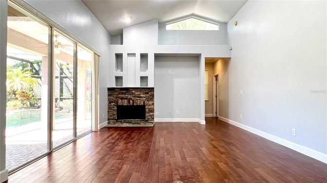 Empty room, Fireplace, Interior, Recessed Lighting, Wood Texture Flooring