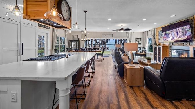 Dining room, Fireplace, Interior, Kitchen, Pendant Lights, Recessed Lighting, Wood Texture Flooring