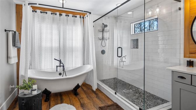 Bathroom, Free Standing Baths, Glass Shower, Interior, Recessed Lighting, Wood Texture Flooring