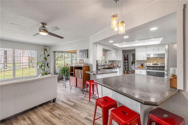 Interior, Kitchen, Pendant Lights, Recessed Lighting, Stainless Steel Appliances, Wood Texture Flooring