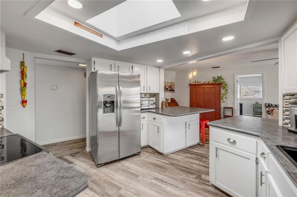Chandelier, Interior, Kitchen, Recessed Lighting, Stainless Steel Appliances, Wood Texture Flooring