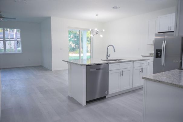 Interior, Kitchen, Pendant Lights, Stainless Steel Appliances, Wood Texture Flooring
