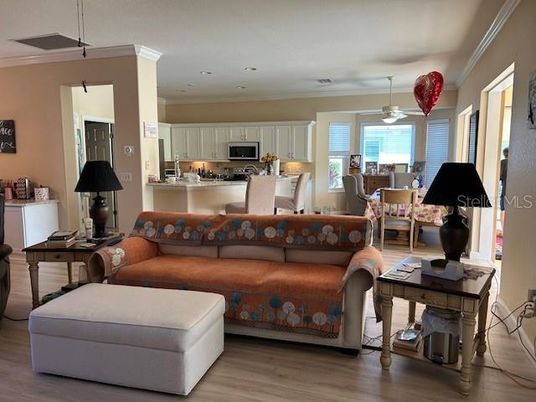 Dining room, Interior, Kitchen, Living room, Pendant Lights, Recessed Lighting, Stainless Steel Appliances, Wood Texture Flooring