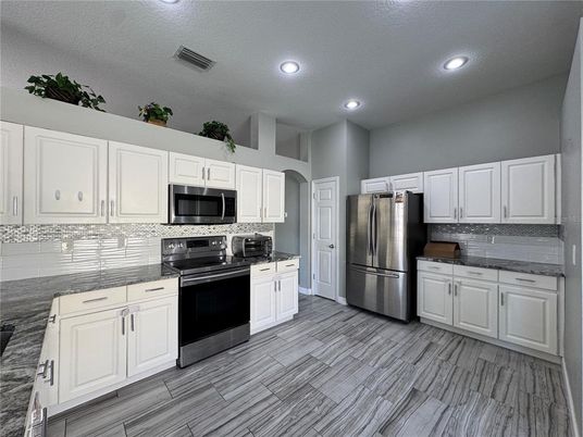 Interior, Kitchen, Recessed Lighting, Stainless Steel Appliances, Wood Texture Flooring