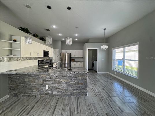 Interior, Kitchen, Pendant Lights, Recessed Lighting, Stainless Steel Appliances, Wood Texture Flooring