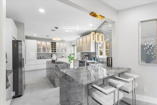 Chandelier, Interior, Kitchen, Marble, Pendant Lights, Recessed Lighting, Stainless Steel Appliances